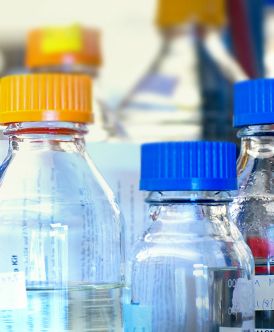 closeup of storage bottles used in scientific research